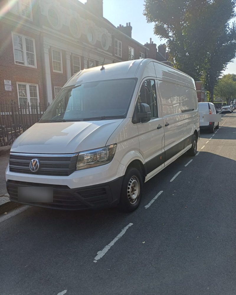 White VW Crafter long-wheelbase van parked on a London street