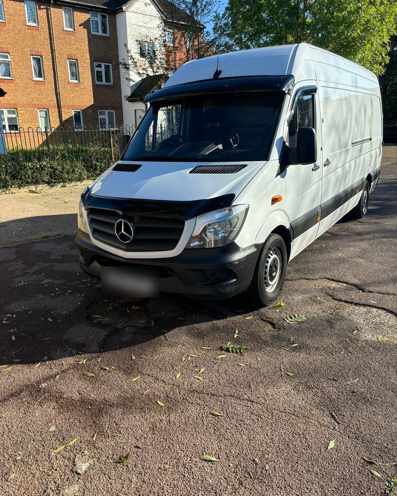 White Mercedes Sprinter extra-long-wheelbase van